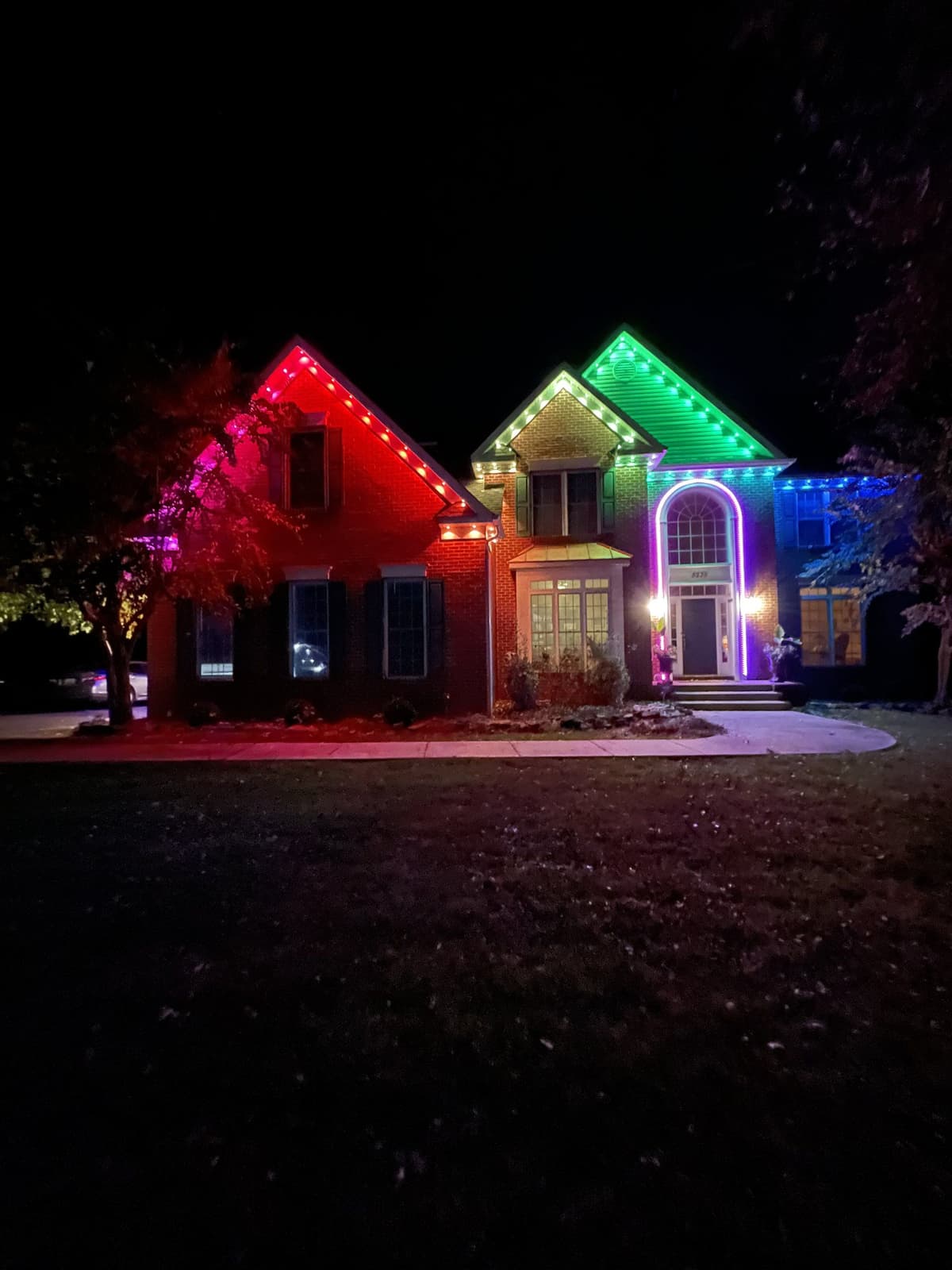 LED roofline installation at night